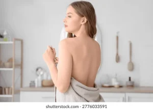 body care products arranged on a clean bathroom shelf