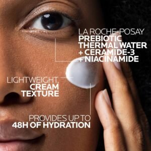 woman applying lightweight moisturizer cream to cheek
